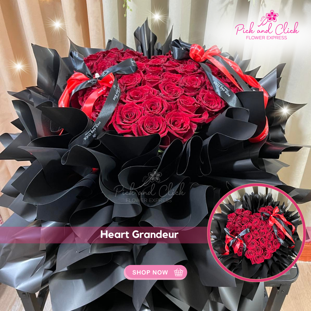 Bouquet of 33 long stem red Ecuadorian roses in black wrap with black and red ribbon — luxurious romantic floral arrangement