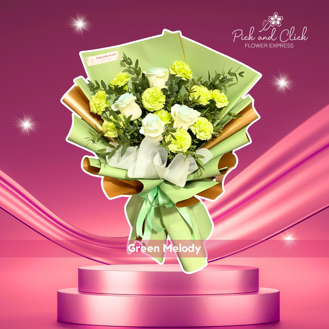 Bouquet of imported white roses, green carnations, and parvy leaves in green and gold two-tone wrap — elegant and peaceful floral gift