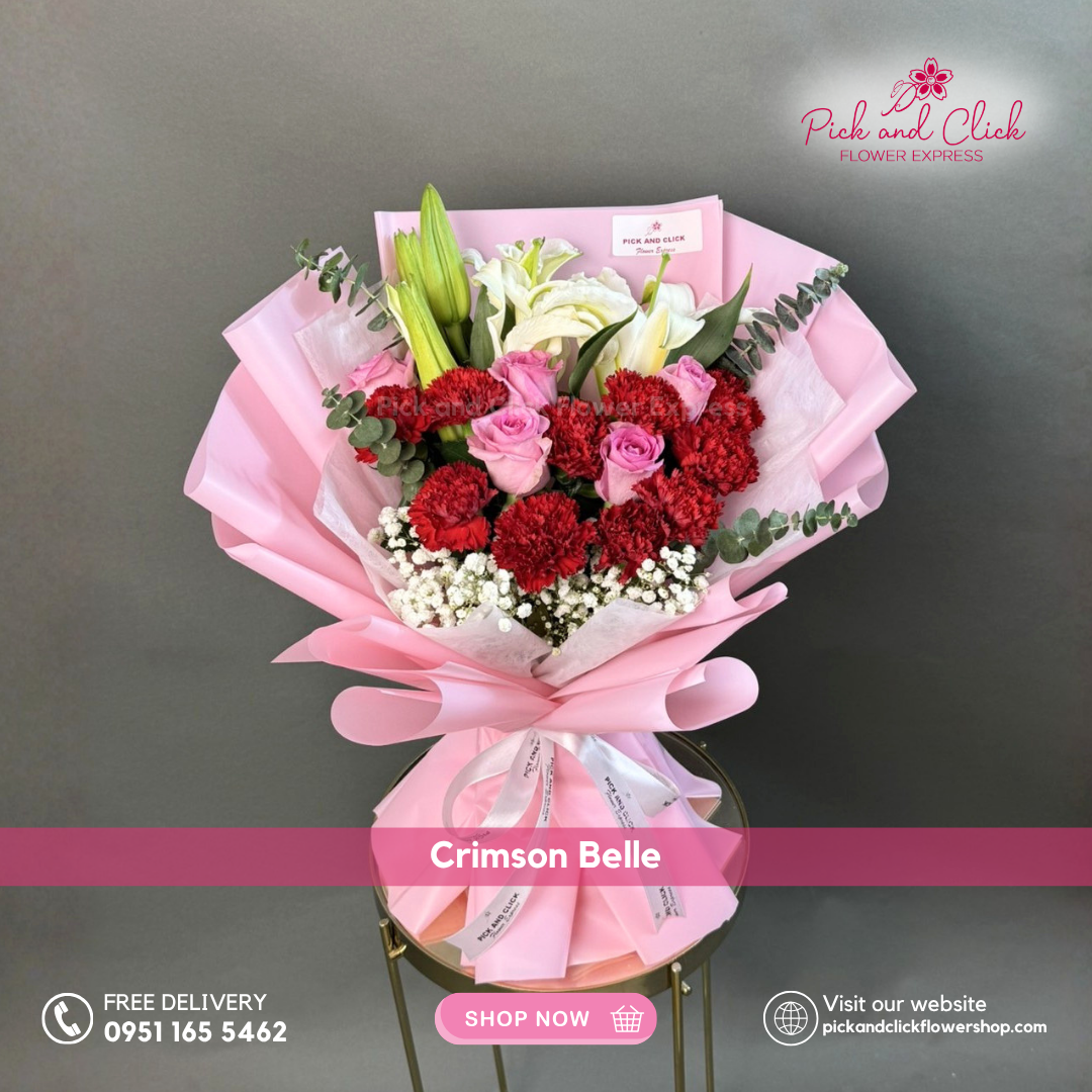 Crimson Belle bouquet featuring imported light pink roses, red carnations, white lilies, gypsophila, and eucalyptus in a luxurious floral arrangement.