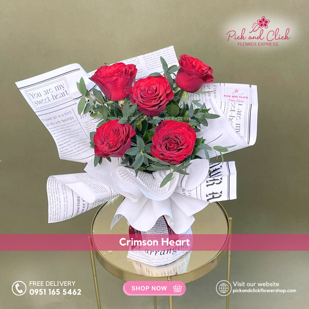 Crimson Heart Bouquet featuring imported red roses accented with fresh parvi leaves, a timeless and elegant floral arrangement perfect for anniversaries, proposals, birthdays, and special occasions in the Philippines.