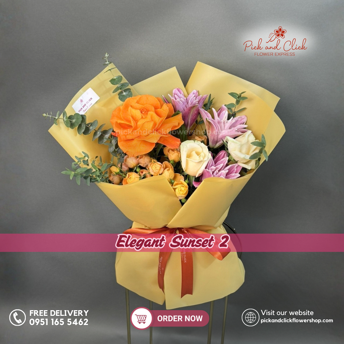Elegant Sunset 2 bouquet featuring orange and peach roses, double petal pink stargazers, orange spray roses, and eucalyptus in a warm elegant floral arrangement.