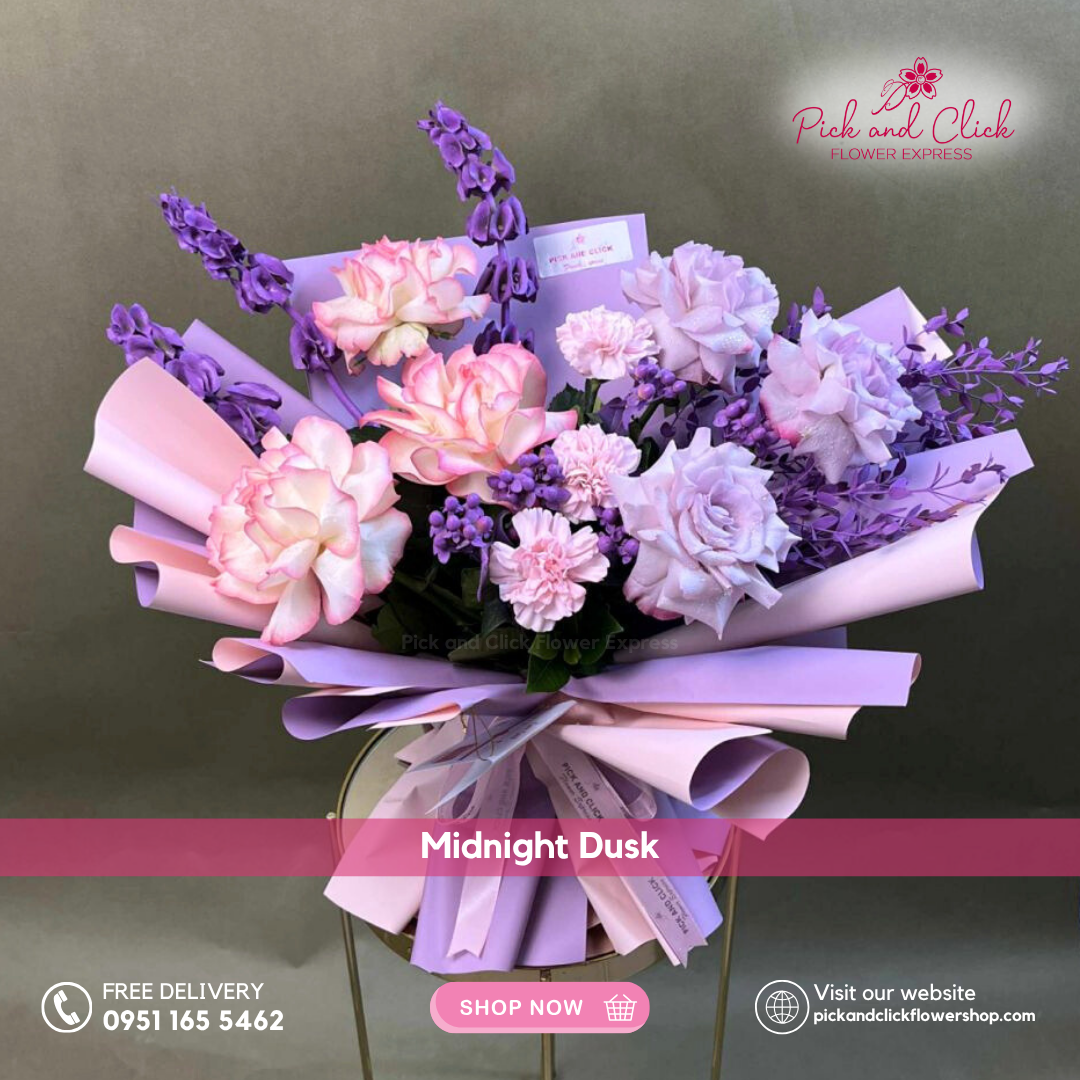 Midnight Dusk Bouquet featuring moody blue roses, two tone pink roses, blue sprayed Bells of Ireland, and fresh parvi leaves, a bold and elegant floral arrangement perfect for romantic gifts, birthdays, and special occasions in the Philippines.