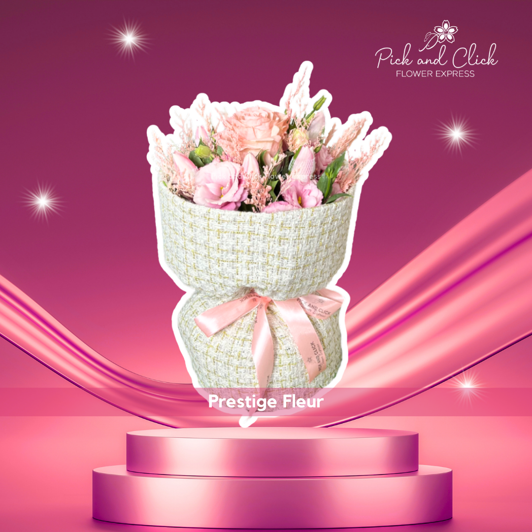 Bouquet of imported Ecuadorian rose, pink lisianthus, tulips, and misty pink in elegant white cloth wrap