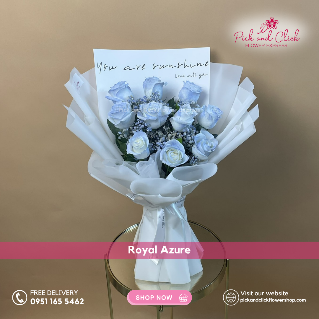 Bouquet of blue and white flowers with a card on a brown background, featuring 'Pick and Click Flower Express' branding.