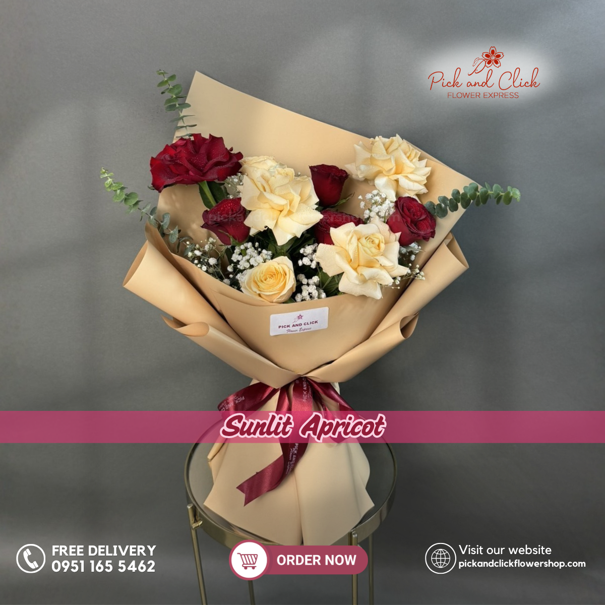 Sunlit Apricot bouquet featuring red roses, peach roses, gypsophila, and eucalyptus in a warm and elegant floral arrangement.