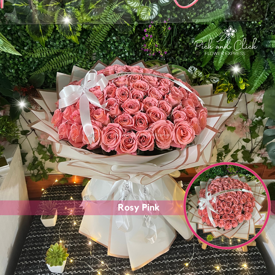 Long stem pink China rose bouquet in white wrap with white ribbon