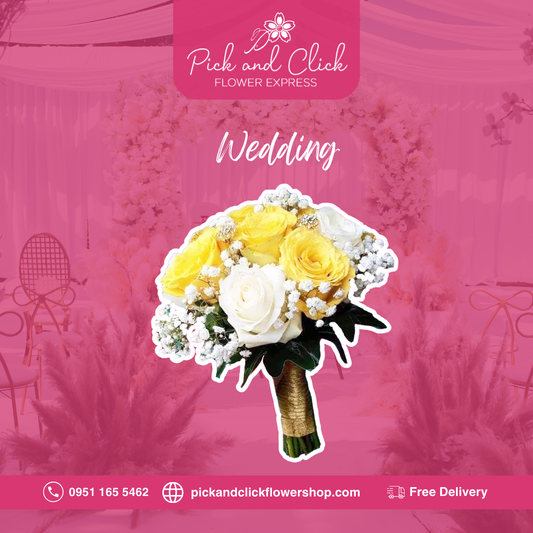 Bridal bouquet of imported white and yellow roses with gypsophila, hand-tied for an elegant wedding arrangement.