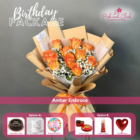 Amber Embrace Birthday Package featuring 10 orange roses with gypsophila, paired with your choice of a Dedication Round Cake or Dream Cake, mug, hand cream, and balloon gift set.