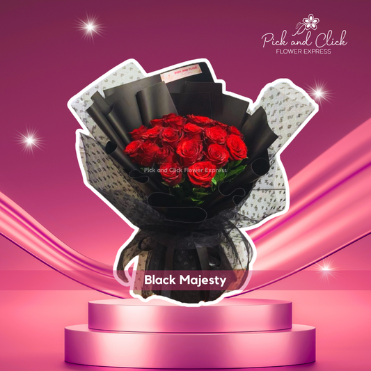 Bouquet of red China roses wrapped in sleek black paper and black net, perfect for bold romantic gestures