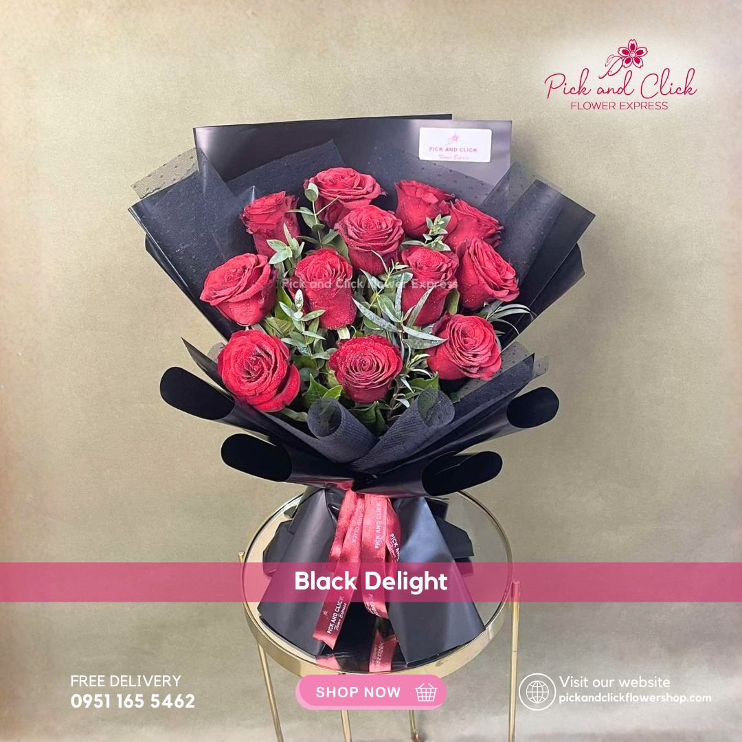 Bouquet of 12 imported red roses and parviflora in black wrap with black net — bold and elegant floral gift