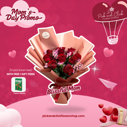Bouquet of imported red roses and statice in rose gold wrapping with freebie — a joyful floral gift for a blissful mom
