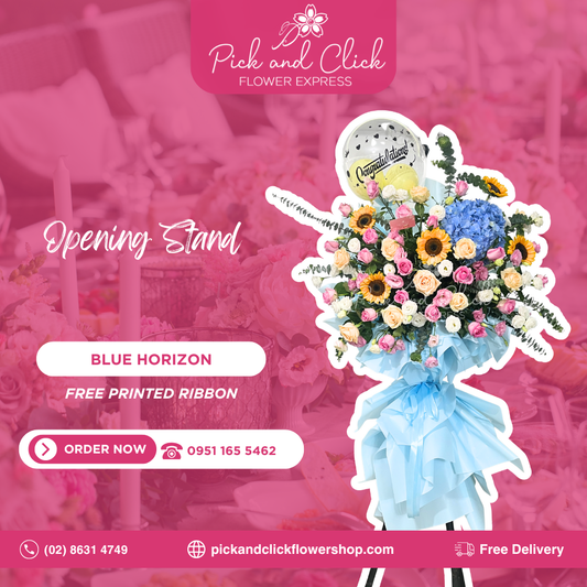 Blue Horizon opening stand featuring blue hydrangeas, sunflowers, peach and hot pink roses, white and pink lisianthus, fresh eucalyptus, and a bobo balloon arranged in a premium standing floral display for grand openings.