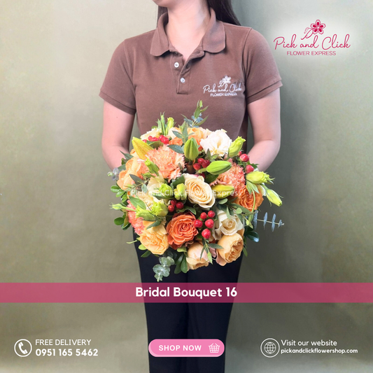 Bridal Bouquet 16 featuring orange roses, orange carnations, orange spray roses, orange stargazer lilies, peach roses, peach lisianthus, berries, and fresh eucalyptus, a vibrant and elegant warm toned bridal bouquet perfect for weddings and special ceremonies in the Philippines.
