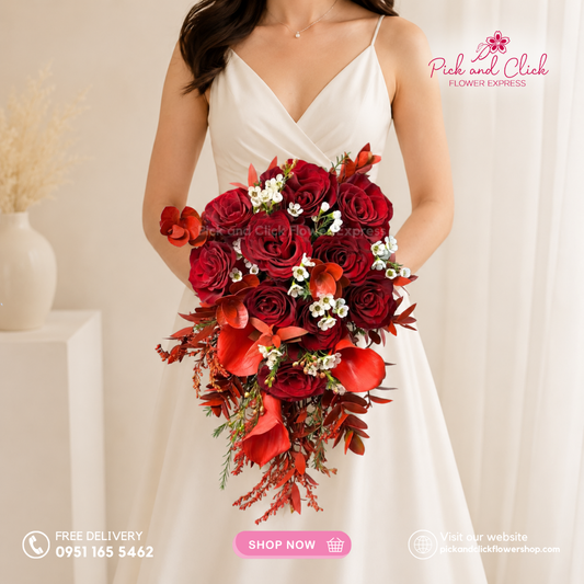 Bridal Bouquet 17 featuring Imported Red Roses, Red-Sprayed Calla Lilies, Eucalyptus, Wax Flowers, and Parvi Leaves in a dramatic cascading bridal bouquet for a wedding in the Philippines.