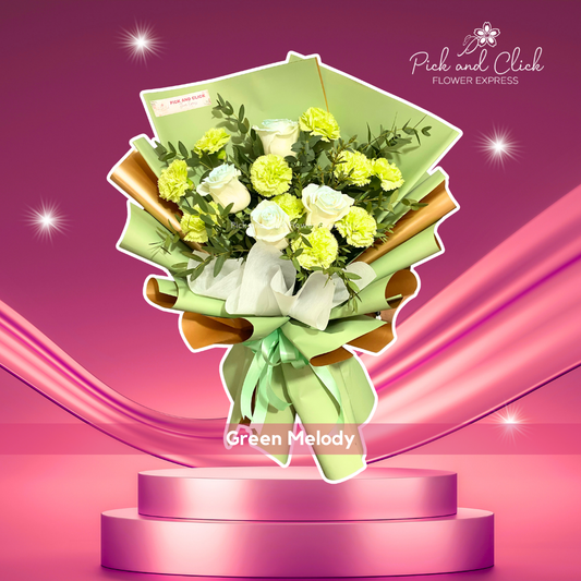 Bouquet of imported white roses, green carnations, and parvy leaves in green and gold two-tone wrap — elegant and peaceful floral gift