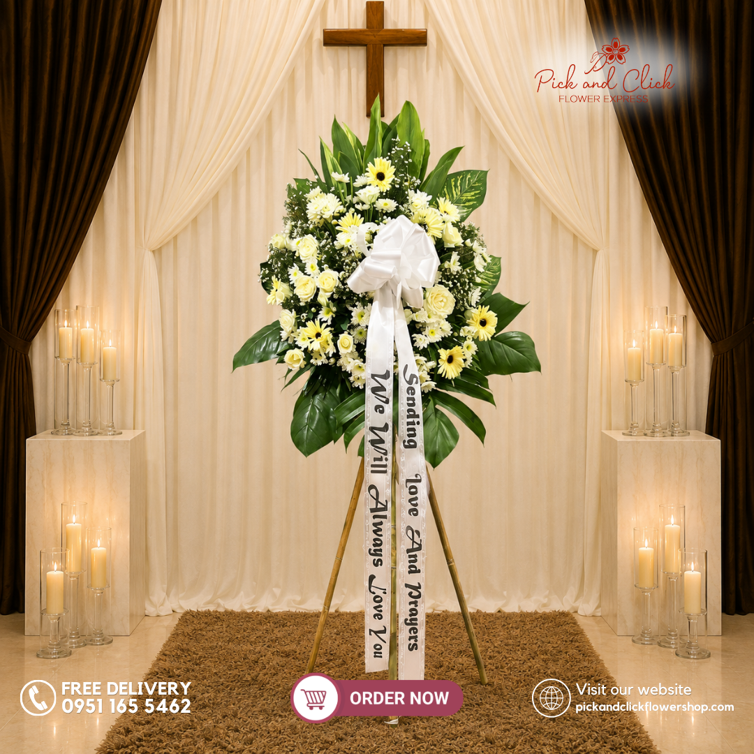 Celestial Comfort Funeral Stand featuring Imported White Roses, White Gerberas, Gypsophila, Dieffenbachia, Tibatib, and Greenline Leaves in an elegant white and green funeral tribute in the Philippines.