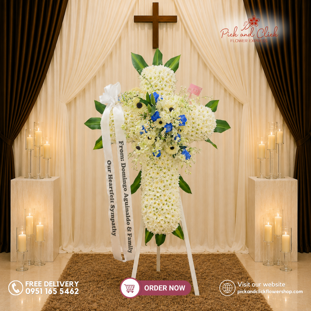 Celestial Cross Funeral Stand featuring Blue-Sprayed Imported White Roses, White Gerberas, White Stargazers, Orchids, Egg Aster, Ruscus, and Fortune Leaves in a serene funeral tribute in the Philippines.