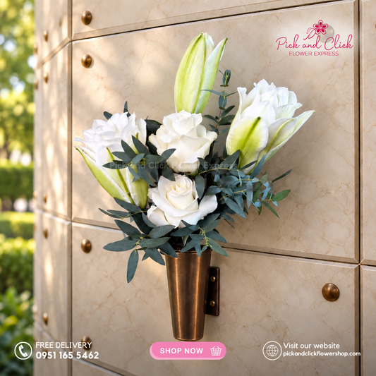 Columbary Arrangement 1 featuring imported white roses, double petal white stargazers, and parvi leaves, a serene and elegant floral arrangement designed for memorial visits, and respectful tributes in the Philippines.