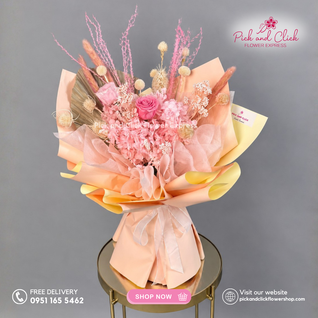 Fairy Pink Dried Bouquet featuring a Preserved Rose accented with Dried Hydrangea, Rice Flowers, Anahaw, Teasel, Craspedia, Pampas Grass, and Ornamental Dried Grasses in a dreamy pink dried flower arrangement in the Philippines.