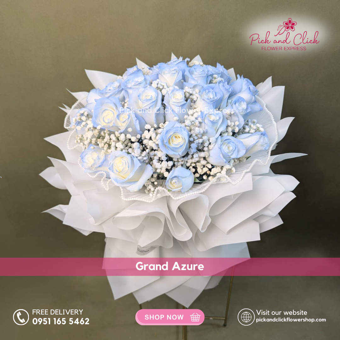 Grand Azure Bouquet featuring 30 blue sprayed white roses accented with soft gypsophila in an elegant premium hand bouquet.