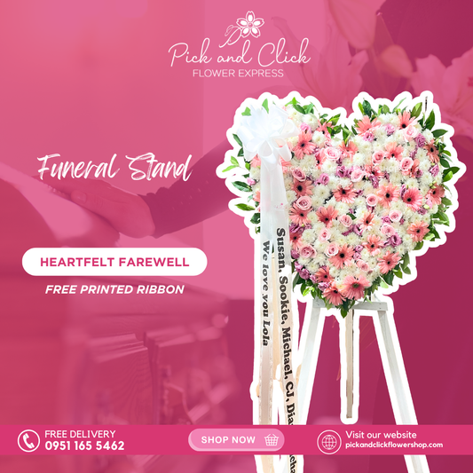 Heart-shaped funeral flower stand with pink China roses, gerbera, lisianthus, and wonder white
