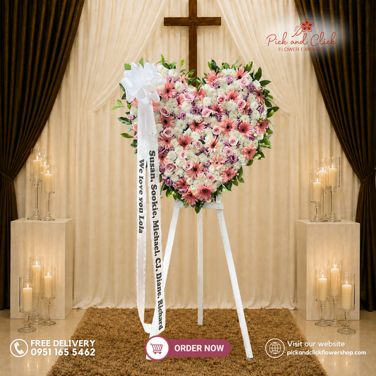 Heartfelt Farewell Funeral Stand featuring Wonder White Chrysanthemums, Pink Gerberas, Imported Light Pink Roses, Pink Lisianthus, and Rosal in an elegant heart-shaped sympathy flower arrangement for funeral services, memorial tributes, and condolences in Metro Manila, Philippines.