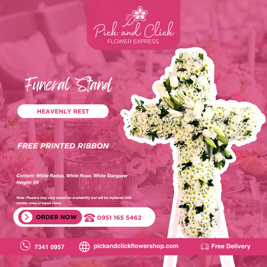 Cross-shaped funeral stand with white Radus, roses, and stargazers in an elegant white floral arrangement