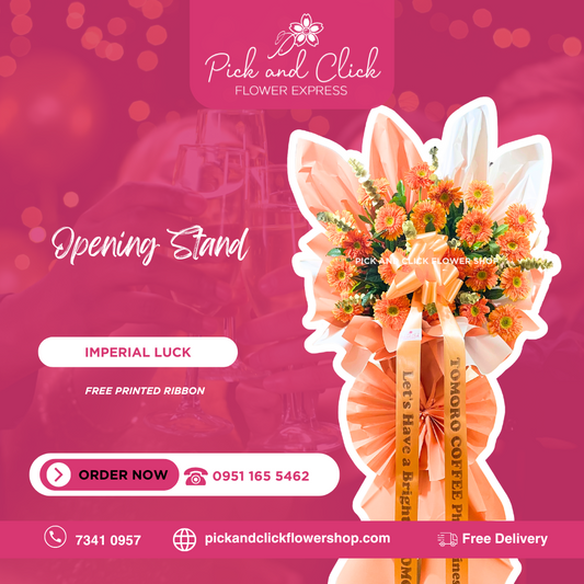 Stand bouquet with orange gerbera, rosal, eucalyptus, wrapped in orange with custom-printed ribbon for celebrations and events.