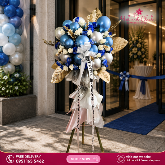 Majestic Luck Opening Stand featuring imported white roses, blue sprayed white roses, gold sprayed eucalyptus, bakya leaves, and balloons, a luxurious and festive floral arrangement designed to symbolize success and prosperity for grand openings and special events in the Philippines.