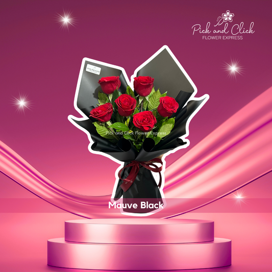 Bouquet of imported red rose with rosal in black wrap — bold and romantic floral arrangement