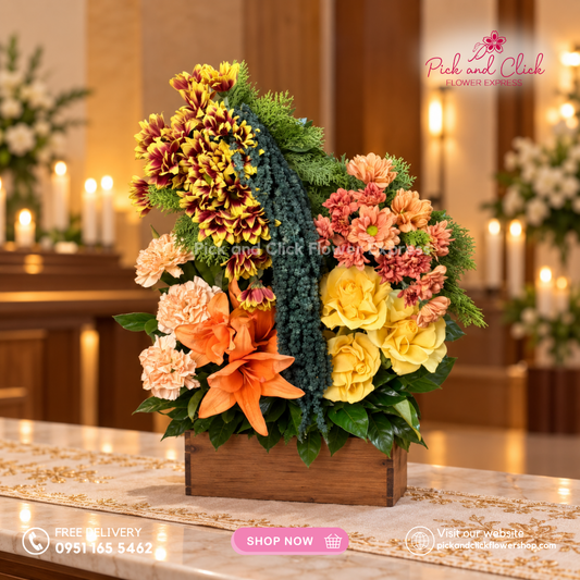 Mini Sympathy 2 featuring a mini funeral arrangement with dahlia, carnation, stargazer, imported rose, and fresh leaf fillers, a simple yet elegant sympathy floral design for respectful tributes and memorial services in the Philippines.