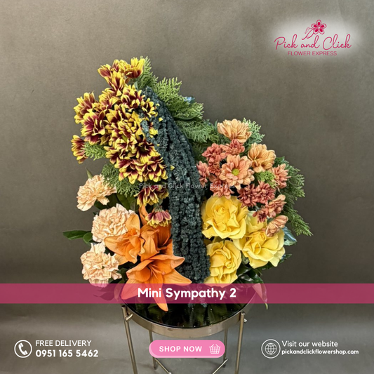 Mini Sympathy 2 featuring a mini funeral arrangement with dahlia, carnation, stargazer, imported rose, and fresh leaf fillers, a simple yet elegant sympathy floral design for respectful tributes and memorial services in the Philippines.