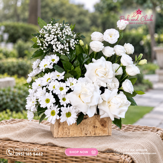 Mini Sympathy 3 featuring a mini funeral arrangement with white roses, white lisianthus, white mums, gypsophila, rosal, a simple yet elegant sympathy floral design for respectful tributes and memorial services in the Philippines.