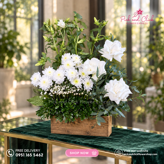 Mini Sympathy 6 featuring a mini funeral arrangement with white roses, radus, white campanula, a simple yet elegant sympathy floral design for respectful tributes and memorial services in the Philippines.