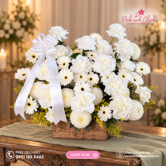 Mini Sympathy 8 featuring a mini funeral arrangement with white roses, white gerberas, white sunlight flowers, and golden rod, a simple yet elegant sympathy floral design for respectful tributes and memorial services in the Philippines.