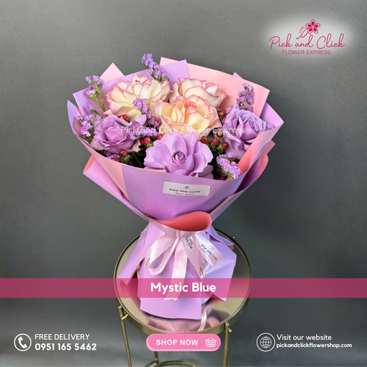 Mystic Blue Bouquet featuring moody blue roses, two tone pink roses, decorative berries, and pink statice, a unique and stylish floral arrangement perfect for birthdays, anniversaries, and special occasions in the Philippines.