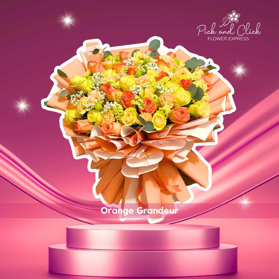 Bouquet of imported orange and yellow roses with carnations in bright orange wrapping, perfect for joyful gifting