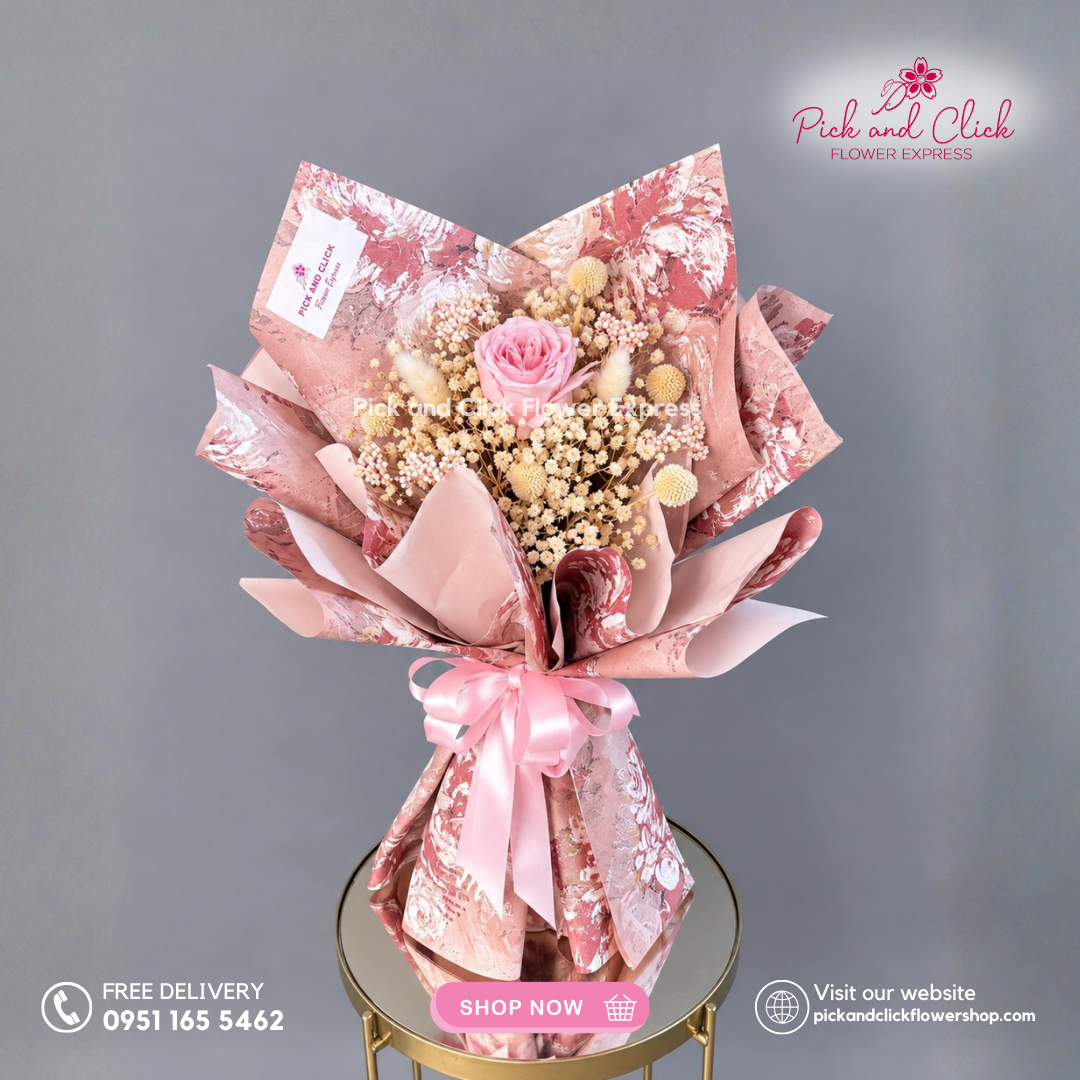 Painted Haze Dried Bouquet featuring a Preserved Rose accented with Dried Gypso, Rice Flower, Craspedia, and Bunny Tail in a soft pink dried flower arrangement in the Philippines.