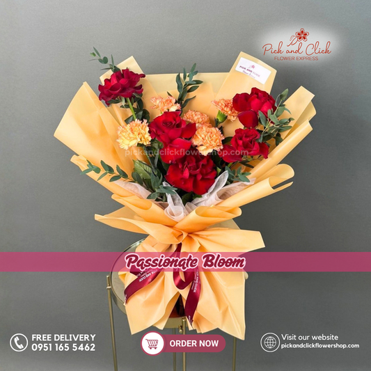 Passionate Bloom Bouquet featuring 5 Imported Red Roses, 5 Two-Tone Orange & Yellow Carnations, and Parvi Leaves in a vibrant romantic flower arrangement in the Philippines.