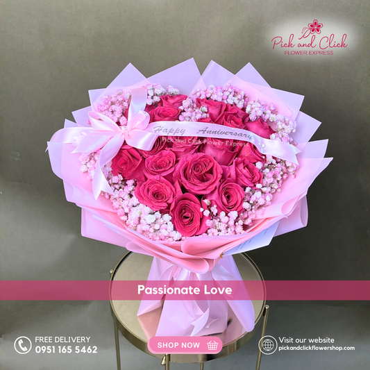 Passionate Love bouquet featuring 20 fuchsia pink roses and pink sprayed gypsophila arranged in a bold romantic hand bouquet.