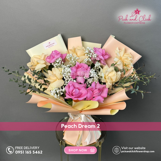 Peach Dream 2 bouquet featuring hot pink roses, peach roses, gypsophila, and parvi leaves in a vibrant floral arrangement.