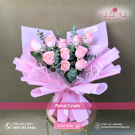 Bouquet of pink roses with a pink bow, branded 'Pick and Click Flower Express', on a dark background.