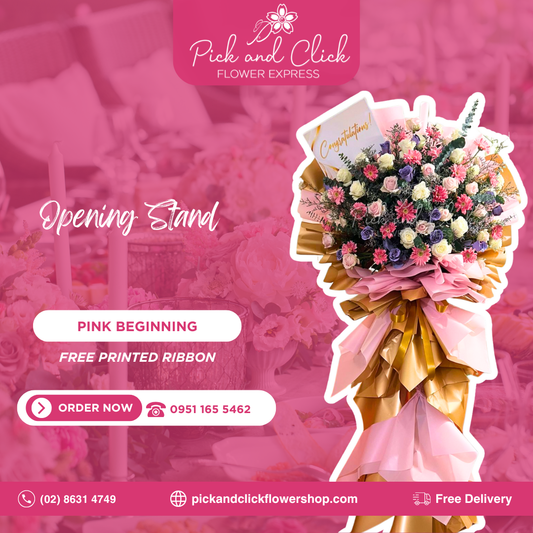 Pink Beginning opening stand featuring white and light pink imported roses, moody blues, pink gerberas, misty blue, eucalyptus, and rosal arranged in an elegant floral stand for grand openings and celebrations.