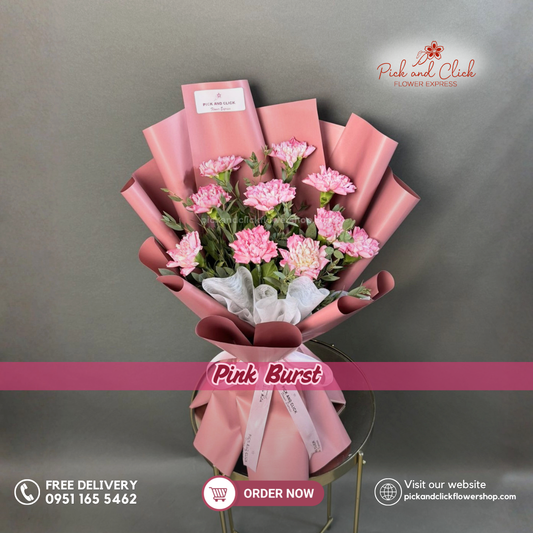 Pink Burst Bouquet featuring hot pink carnations accented with fresh parvi leaves, arranged in a bright and cheerful floral design, a vibrant bouquet perfect for birthdays, Mother's Day, celebrations, and special occasions in the Philippines.