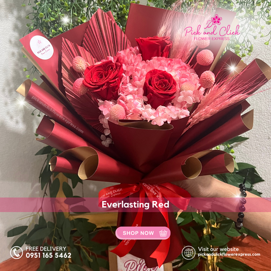 Bouquet with preserved rose and dried flowers in red and gold two-tone wrap