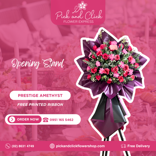 Prestige Amethyst opening stand featuring fuchsia pink roses, pink-sprayed wonder white, eryngium, aster, and fresh eucalyptus arranged in a premium floral stand for grand openings and corporate events.