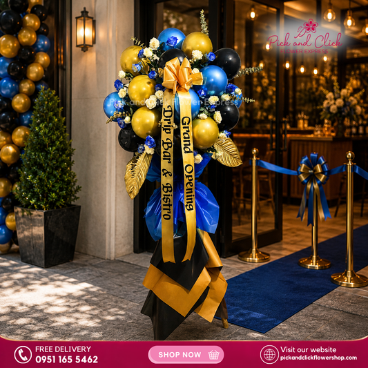 Royal Luck Opening Stand featuring imported white roses, blue sprayed white roses, gold sprayed dieffenbachia, fresh eucalyptus, and balloons, a luxurious and festive floral arrangement designed to bring prosperity and celebrate grand openings and special events in the Philippines.