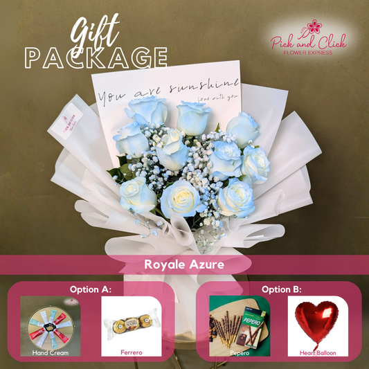 Royale Azure bouquet featuring 10 light blue sprayed imported white roses and gypsophila arranged in an elegant pastel hand bouquet.