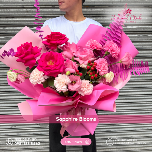 Imported hot pink and fuchsia roses, carnations, lisianthus, berries, and pink-sprayed foliage bouquet – Metro Manila flower delivery