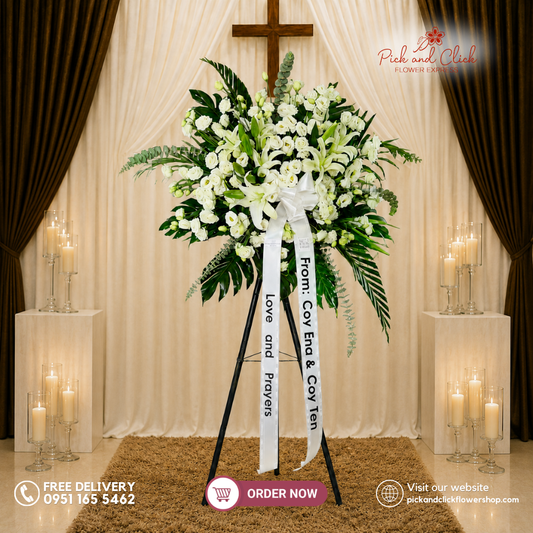 Serene Tribute Funeral Stand with White Stargazers, White Lisianthus, Tibatib, Palmera, and Eucalyptus for funeral and memorial services in the Philippines.